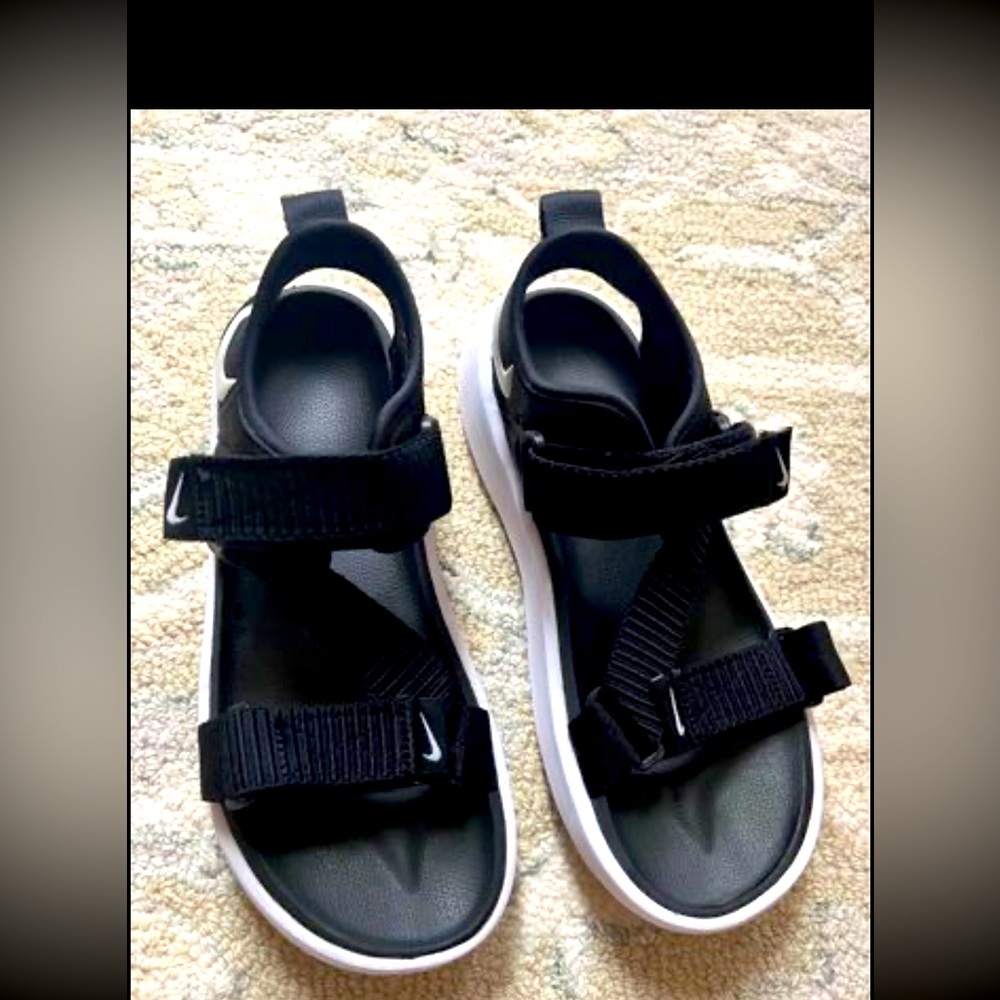 Nike sport sandals with strap.